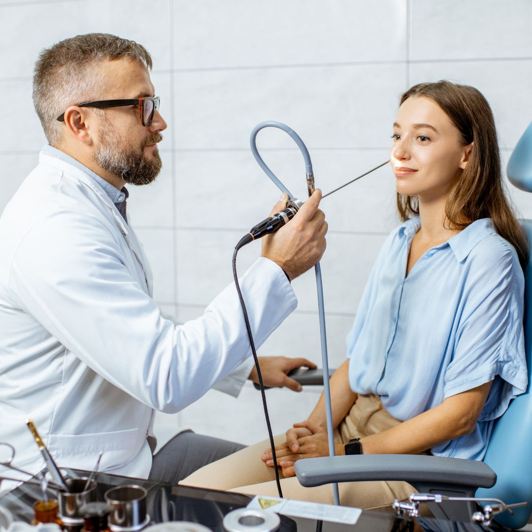 Woman being examined by an ENT specialist